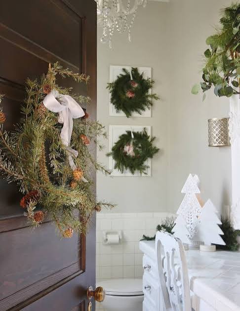 Vintage Bathroom Corner with Framed Wreaths and Ceramic Trees Vintage Bathroom Corner with Framed Wreaths and Ceramic Trees — Christmas Bathroom Decor