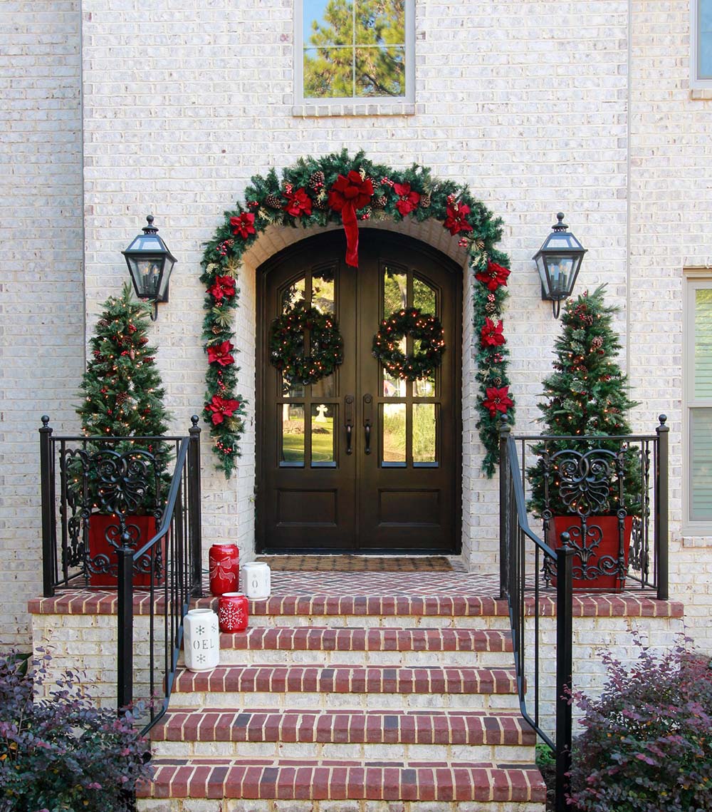 Grand Traditional Christmas Garland with Poinsettias on Double Doors — Traditional Christmas Decor