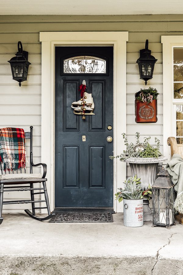 Farmhouse Front Door with Skates and Plaid Accents Farmhouse Front Door with Skates and Plaid Accents — Christmas Porch Decor