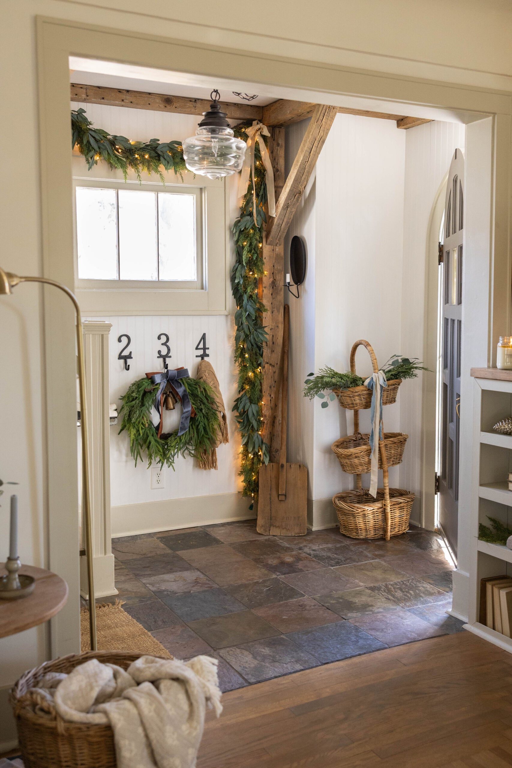 Farmhouse Entryway with Lush Wreath and Lighted Garland Farmhouse Entryway with Lush Wreath and Lighted Garland — Christmas Entryway Decor