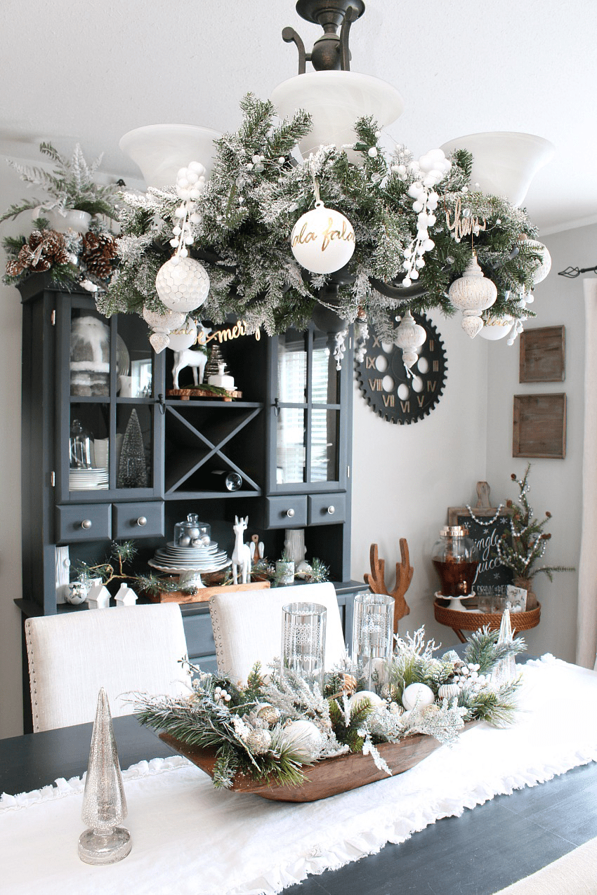 Farmhouse Dining Room with an Ornament-Adorned Chandelier — Christmas Dining Room Decor