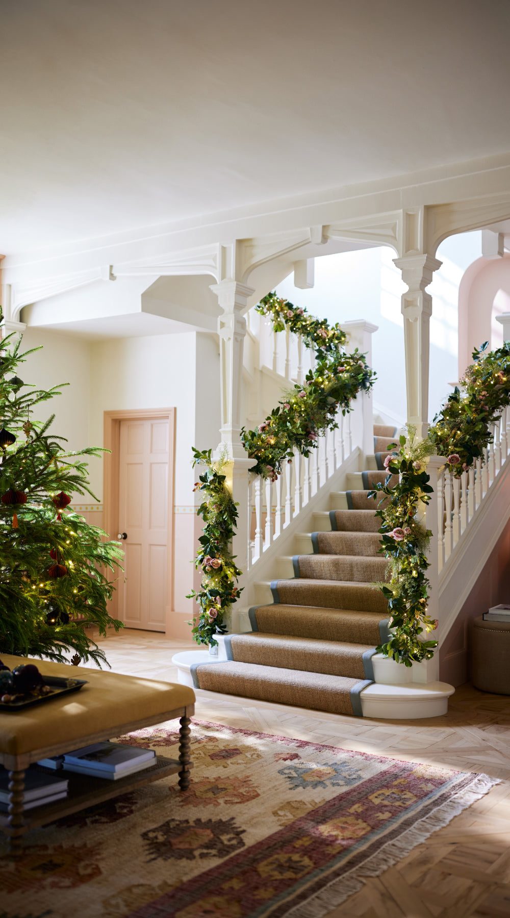 Bright Hallway with Greenery Garland and Pink Accents Bright Hallway with Greenery Garland and Pink Accents — Christmas Staircase Decor