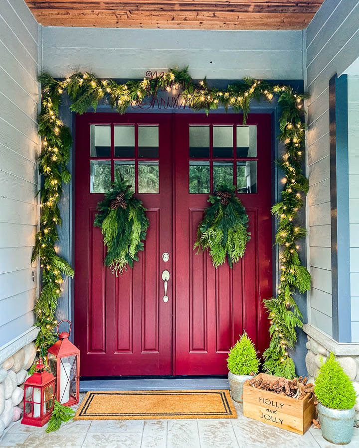 Bold Red Double Doors with Festive Pine Garland — Christmas House Exterior Decor