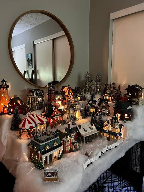 Cozy Traditional Village Illuminated on a Tabletop Cozy Traditional Village Illuminated on a Tabletop — Christmas Village Display