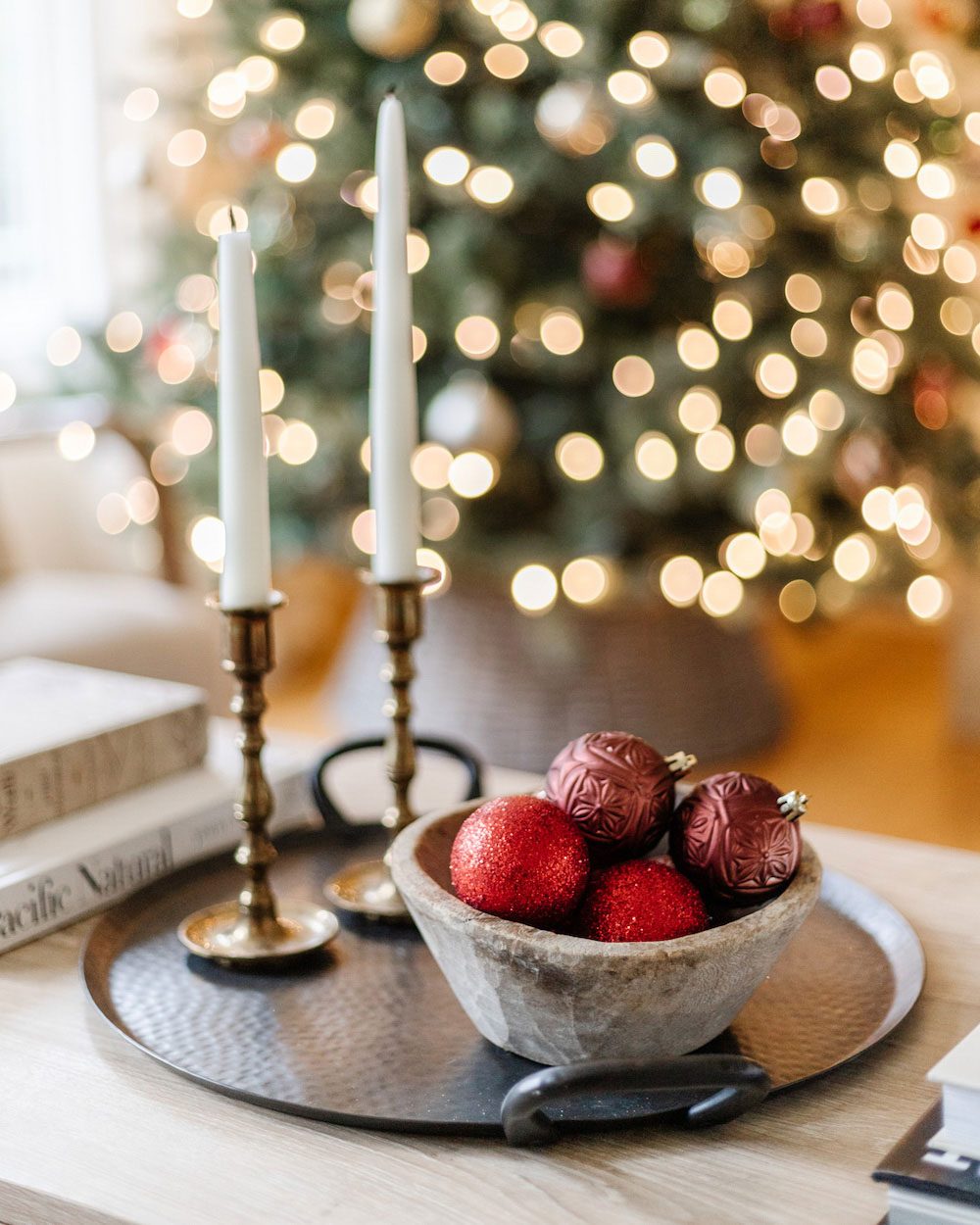 Rustic Coffee Table Vignette with Red Ornaments — Whimsical Christmas Decor