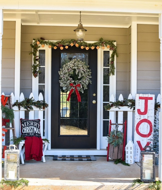 Welcoming Porch with Lush Wreath, Garland, and Festive Sled — Farmhouse Christmas Porch