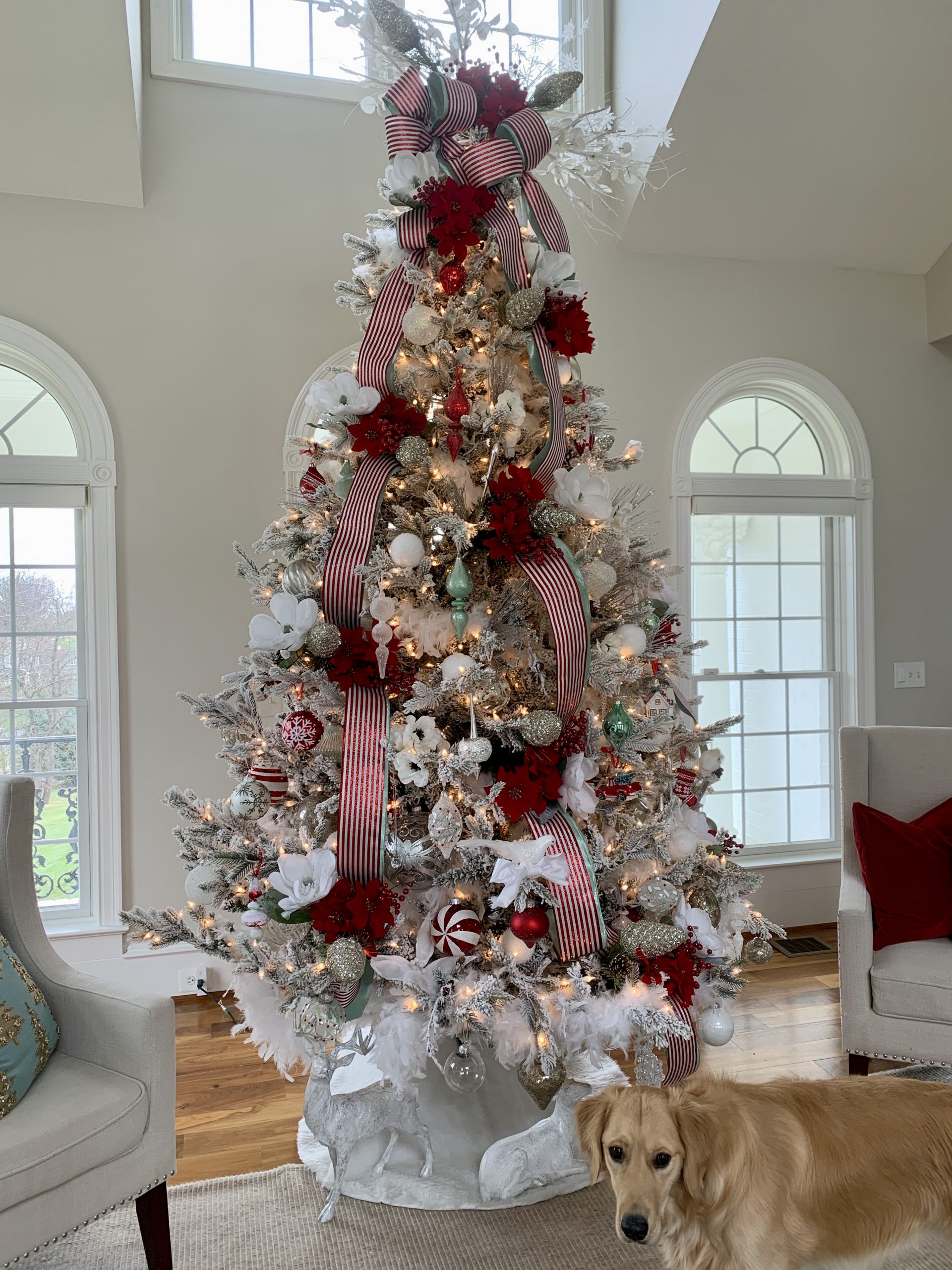 Elegant Flocked Tree with Red Flowers and Arched Windows — Christmas Tree Decorating