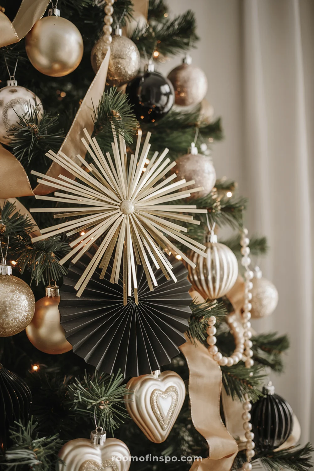 Modern Tree with Gold, Black, and White Ornaments Modern Tree with Gold, Black, and White Ornaments — Christmas Tree Trends 2026