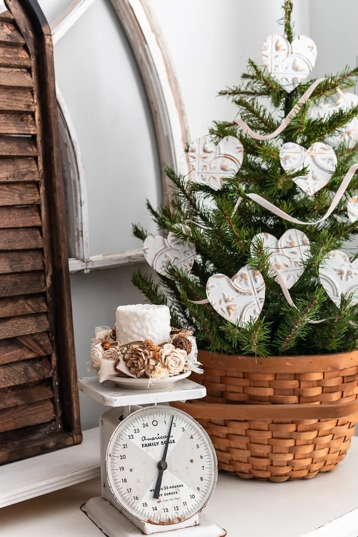 Farmhouse Vignette with a Miniature Christmas Tree on a Vintage Scale Farmhouse Vignette with a Miniature Christmas Tree on a Vintage Scale — White Christmas Decor