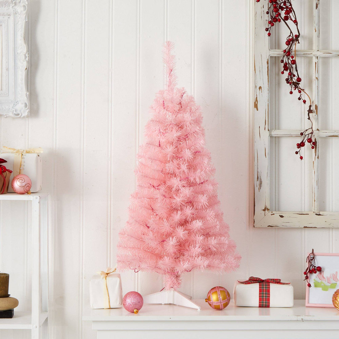 Kitschy Pink Artificial Christmas Tree on a Shelf — Pink Christmas Decor