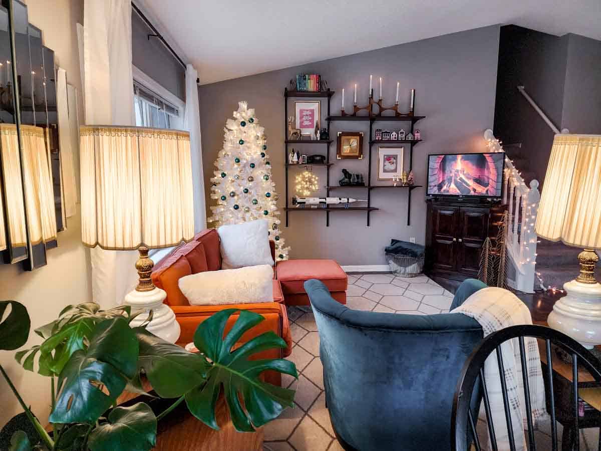Mid-Century Modern Living Room with White Christmas Tree and Teal Accents — Modern Christmas Decor