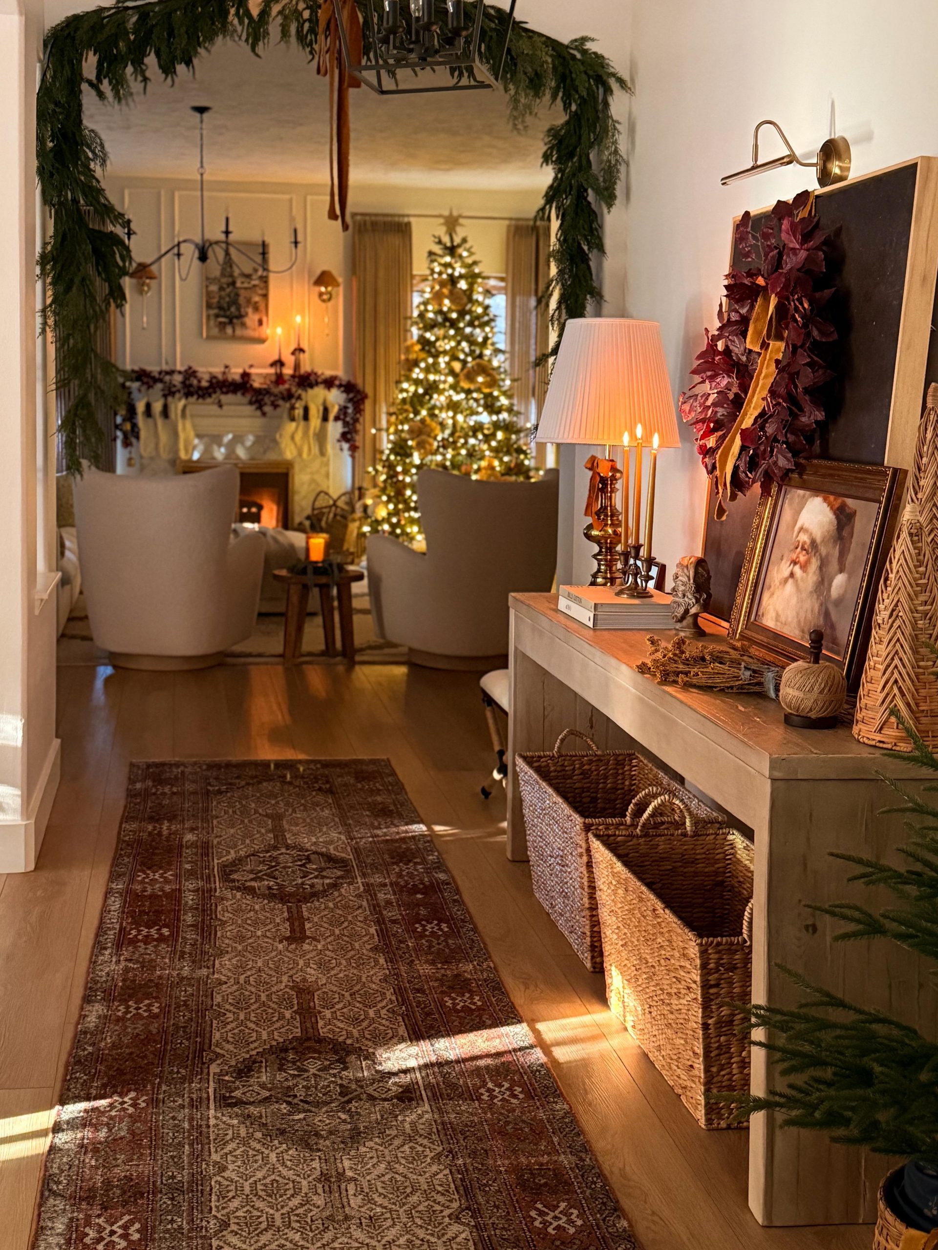 Cozy Traditional Entryway with Festive Garland and Lit Tree Cozy Traditional Entryway with Festive Garland and Lit Tree — Christmas Entryway Decor