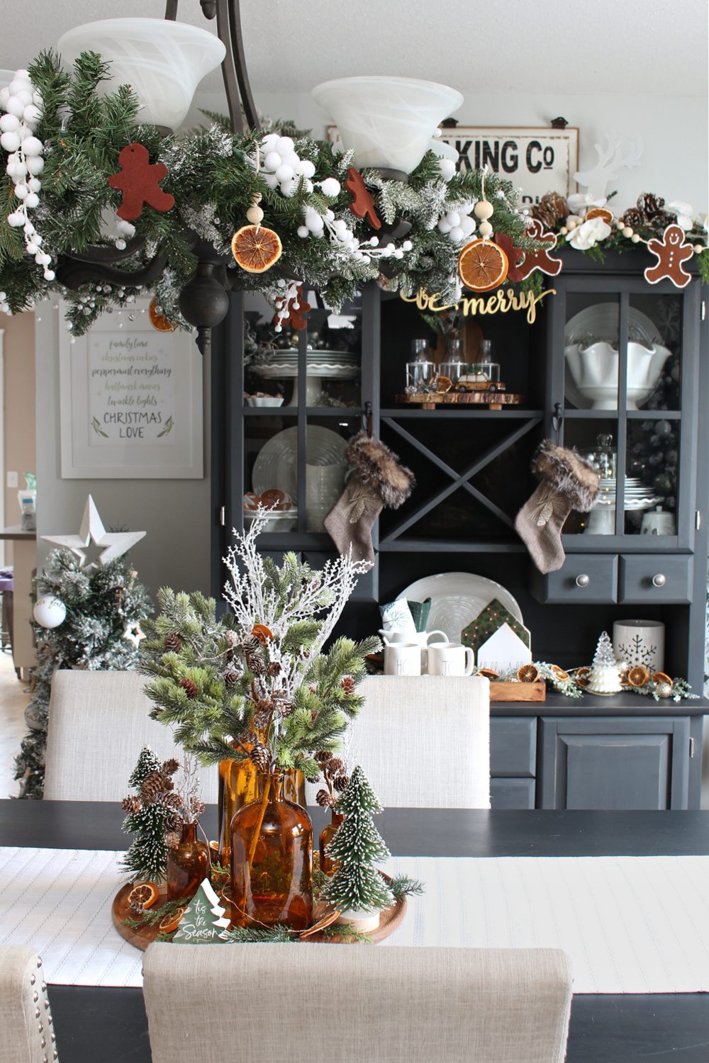 Farmhouse Hutch Decorated for Christmas with Stockings and Gingerbread — Christmas Dining Room Decor