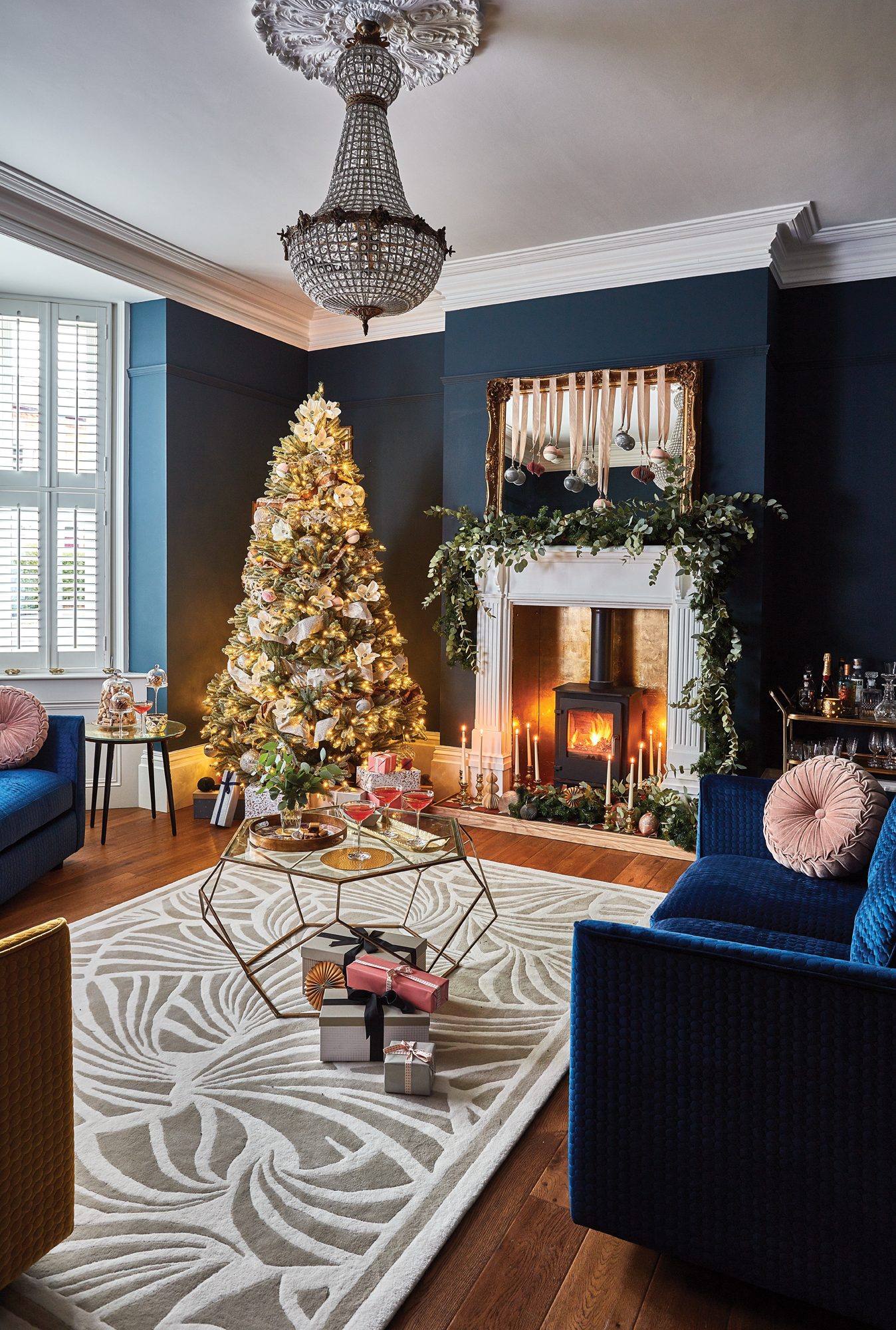 Glamorous Christmas Living Room with Navy Walls and Gold Accents Glamorous Christmas Living Room with Navy Walls and Gold Accents — christmas decor trends 2026