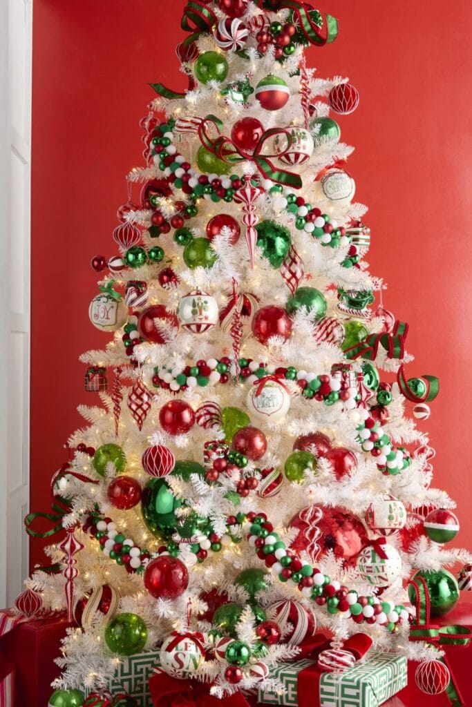 White Christmas Tree Adorned with Abundant Red and Green Decor White Christmas Tree Adorned with Abundant Red and Green Decor — Red and Green Christmas Decor