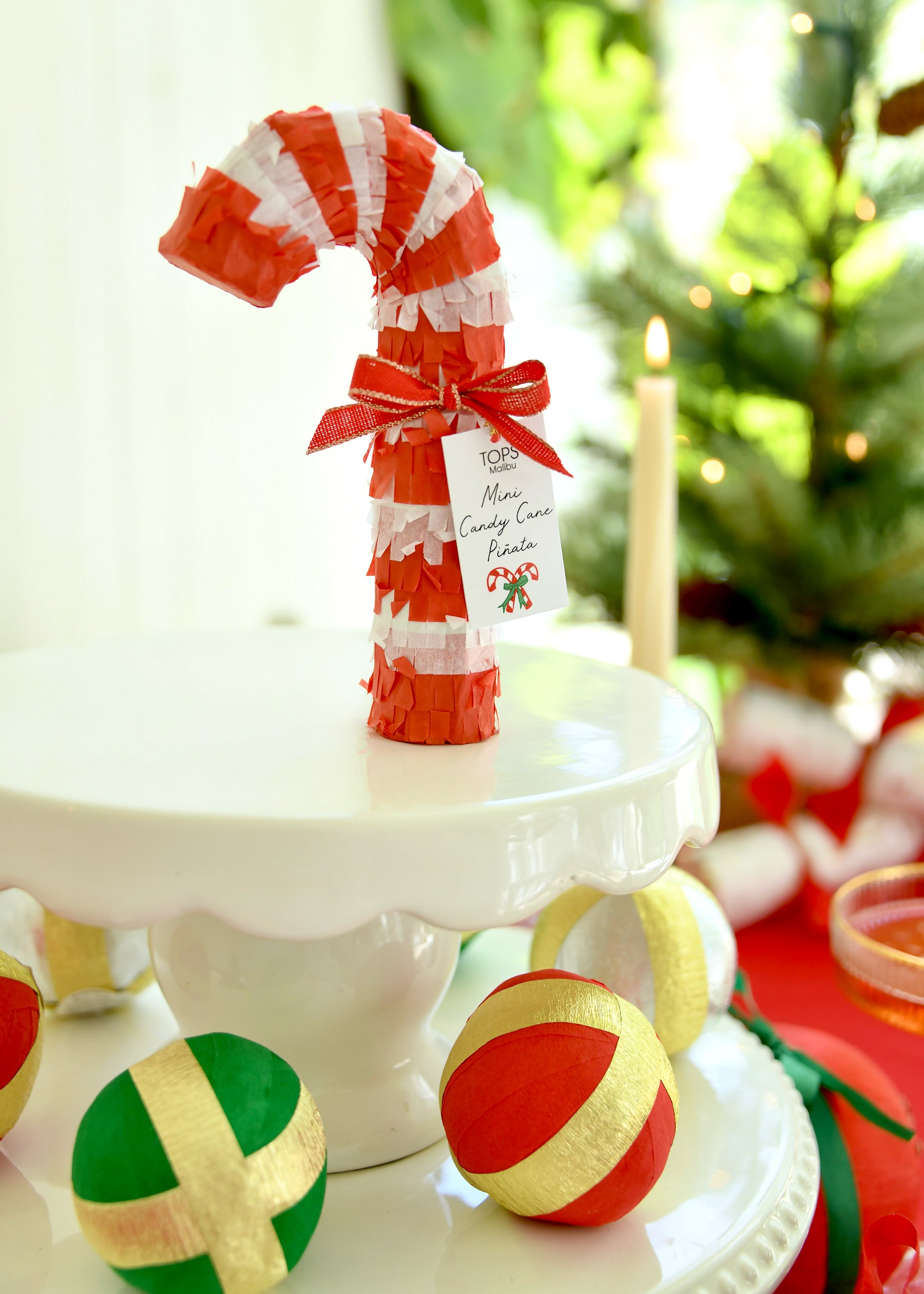 Candy Cane Piñata as a Festive Table Centerpiece — Candy Cane Christmas Decor