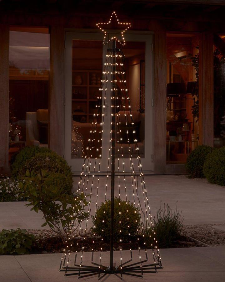 Elegant Cone-Shaped Light Tree on Patio — Christmas Light Display Ideas