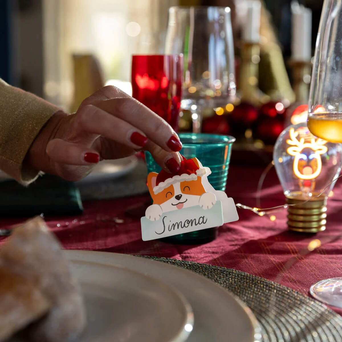 Cute Corgi Christmas Place Cards on Red Tablecloth