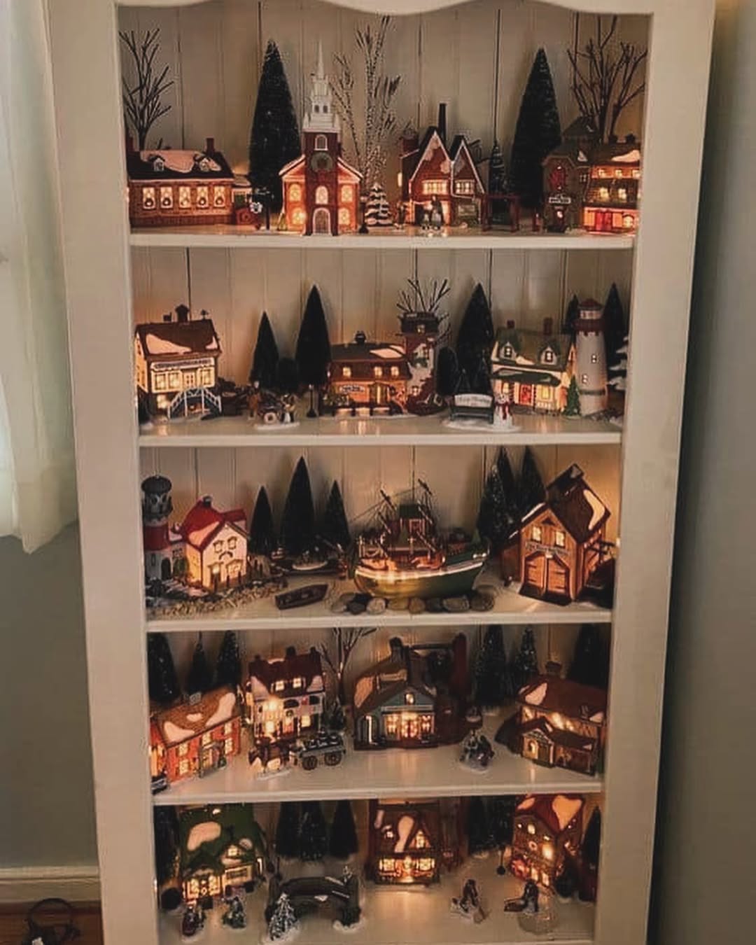 Extensive Village Collection within a Display Cabinet Extensive Village Collection within a Display Cabinet — Christmas Village Display
