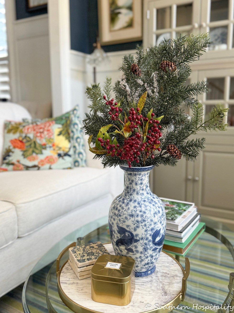 Evergreen Branches and Berries in Blue and White Vase Evergreen Branches and Berries in Blue and White Vase — Winter Decor After Christmas