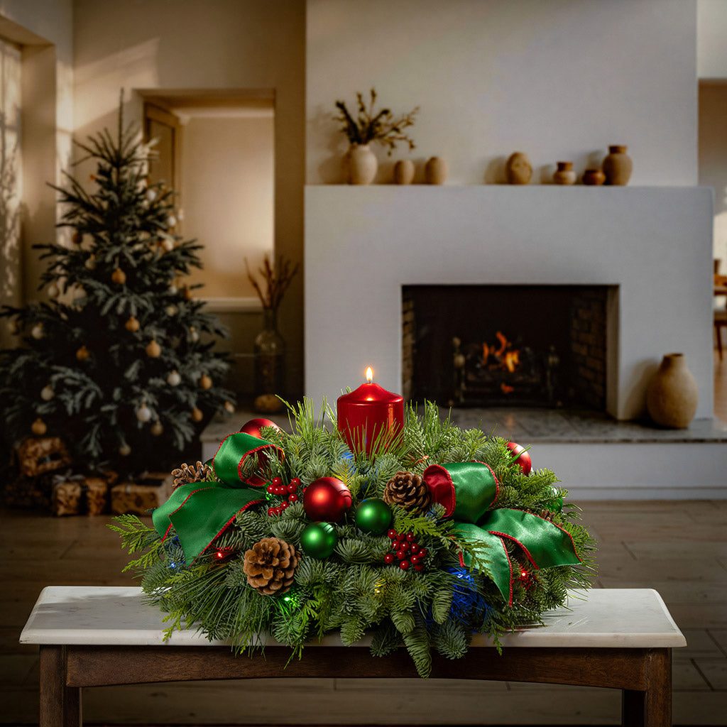 Abundant Greenery Arrangement with Red Candle and Ornaments — Christmas Centerpiece