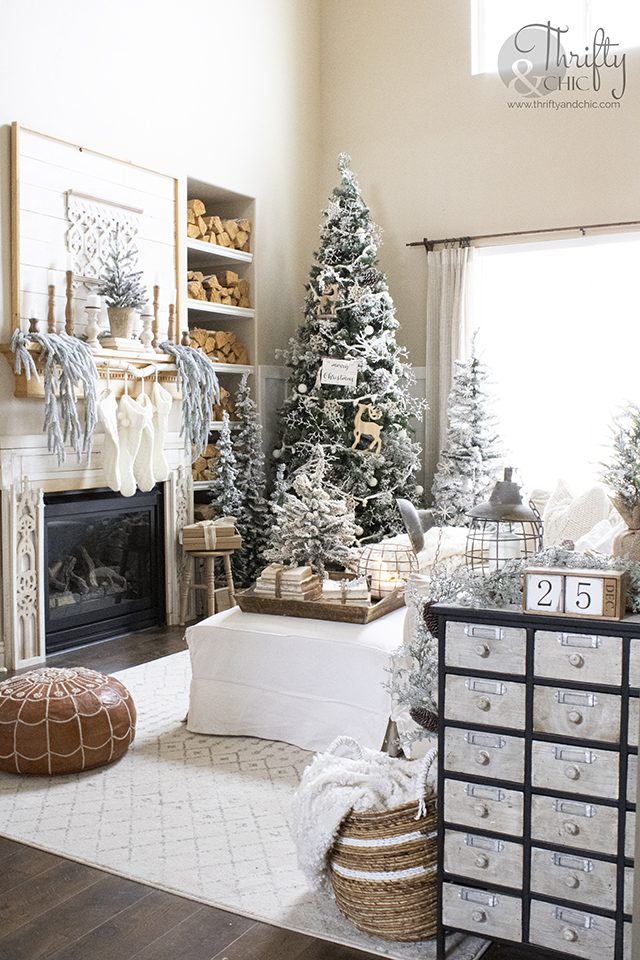 Abundance of Frosted Christmas Trees in a Cottage Farmhouse Living Room Abundance of Frosted Christmas Trees in a Cottage Farmhouse Living Room — White Christmas Decor