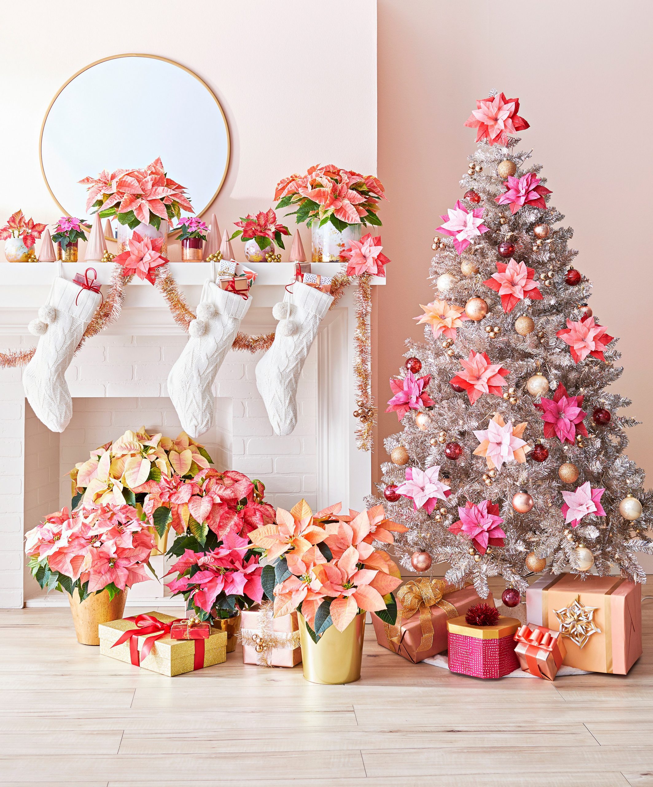 Pink Poinsettia Accents on a Silver Christmas Tree — Christmas Decor