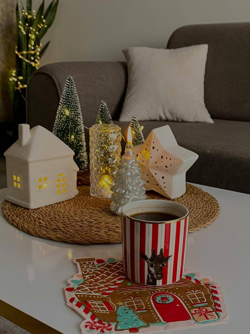 Whimsical Coffee Table with Ceramic House and Mug Whimsical Coffee Table with Ceramic House and Mug — Christmas Coffee Table Decor