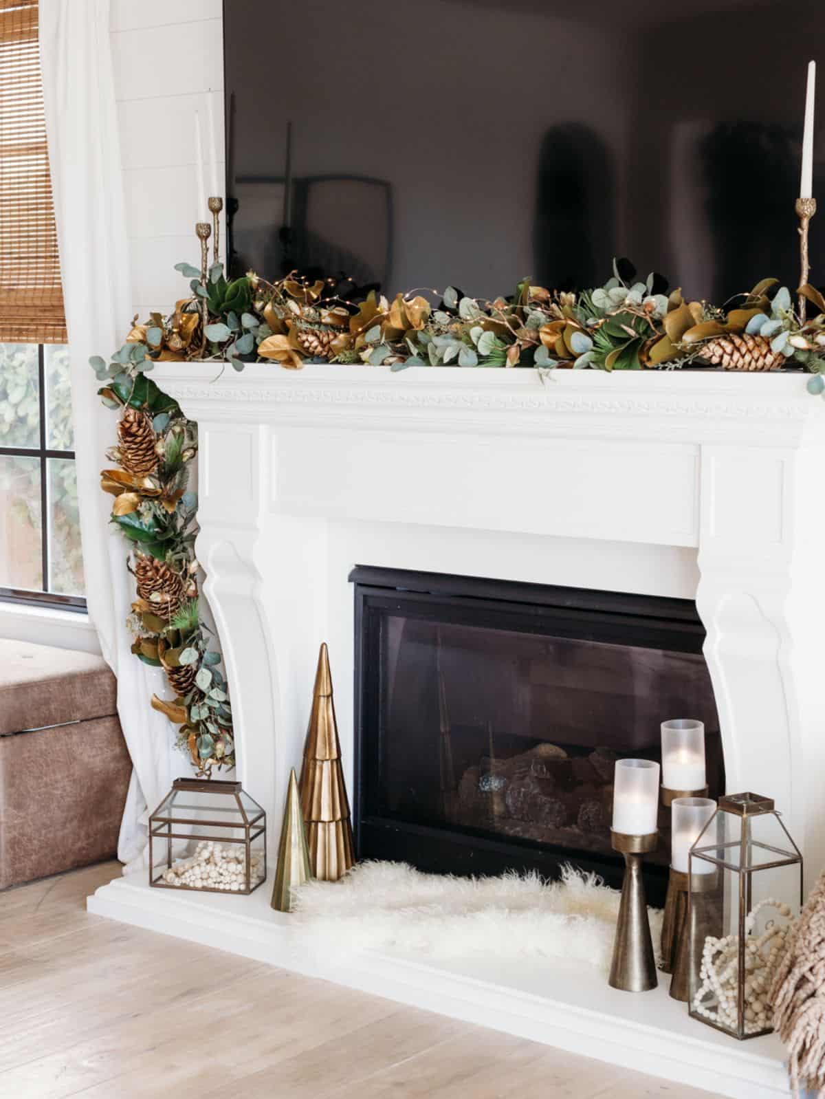 Elegant White Marble Mantel with Gold Garland Elegant White Marble Mantel with Gold Garland — Christmas Mantel Decor