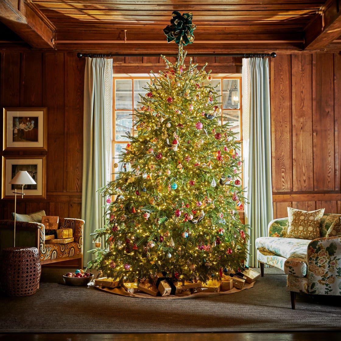 Wood-Paneled Living Room with Traditional Tree and Warm White Lights Wood-Paneled Living Room with Traditional Tree and Warm White Lights — Christmas Tree with Colored Lights