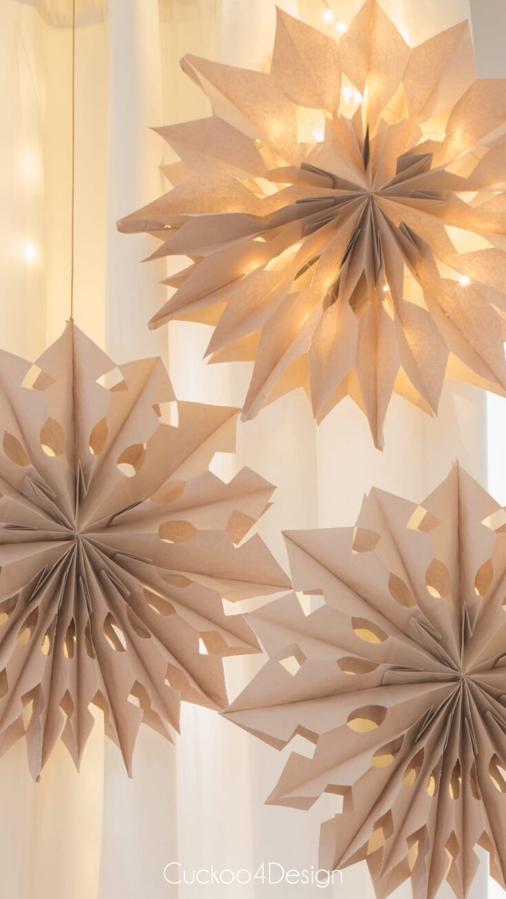 Minimalist 3D Paper Bag Snowflakes with Bokeh Lights — Paper Snowflakes