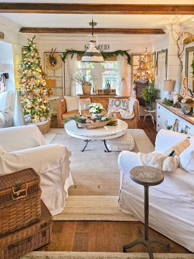 Open-Plan Living Room with Multiple Christmas Trees — Rustic Christmas Decor