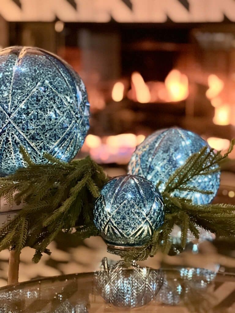 Elegant Blue Glass Ornaments and Pine Branch Detail Elegant Blue Glass Ornaments and Pine Branch Detail — Cozy Christmas Decor