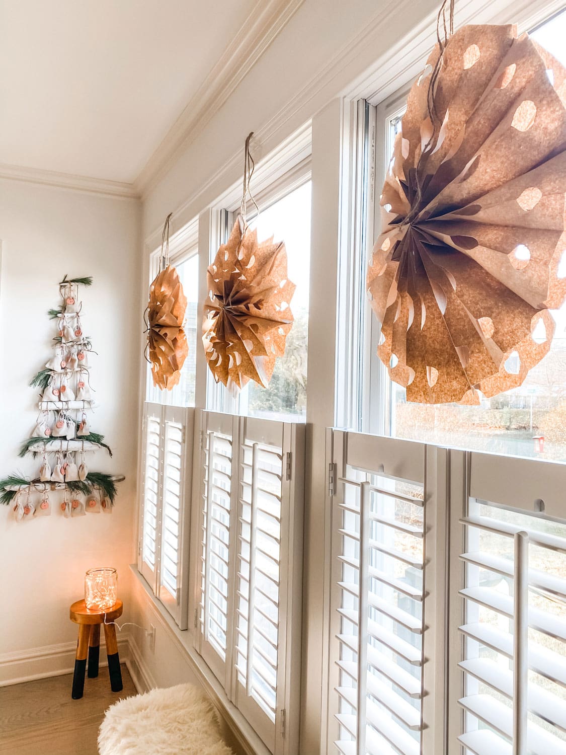 Brown Paper Snowflakes in a Cozy Window Nook