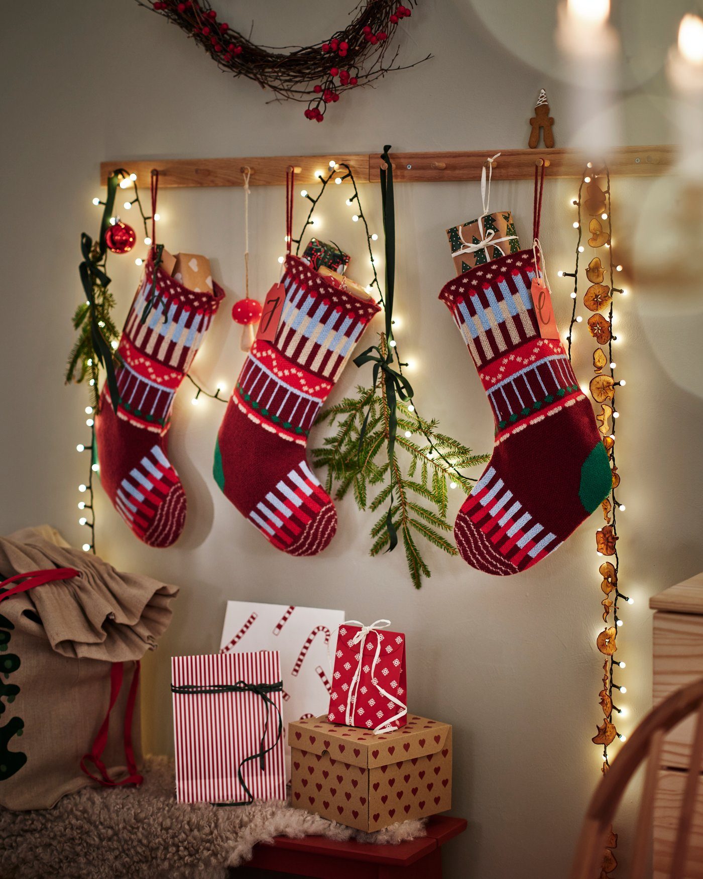 Modern Wall Display with Patterned Knits — Christmas Stockings Display