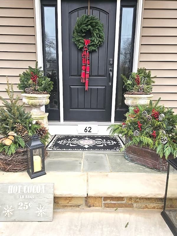 Traditional Porch with Natural Greenery and Urns Traditional Porch with Natural Greenery and Urns — Christmas Porch Decor