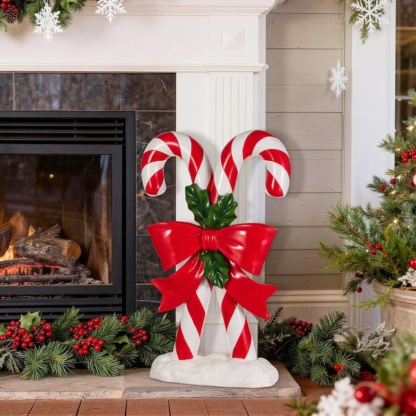 Freestanding Candy Cane Decoration on a Porch — Candy Cane Christmas Decor