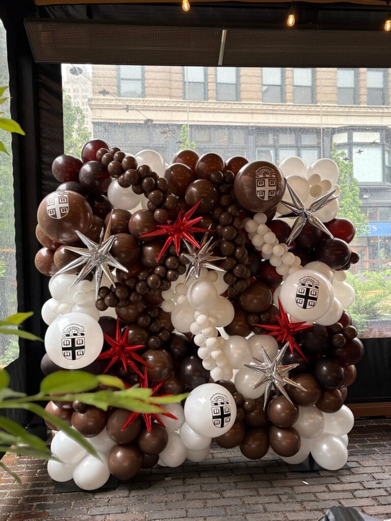 Brown, White, and Dark Red Balloon Garland on an Outdoor Patio Brown, White, and Dark Red Balloon Garland on an Outdoor Patio — Christmas Balloon Garland