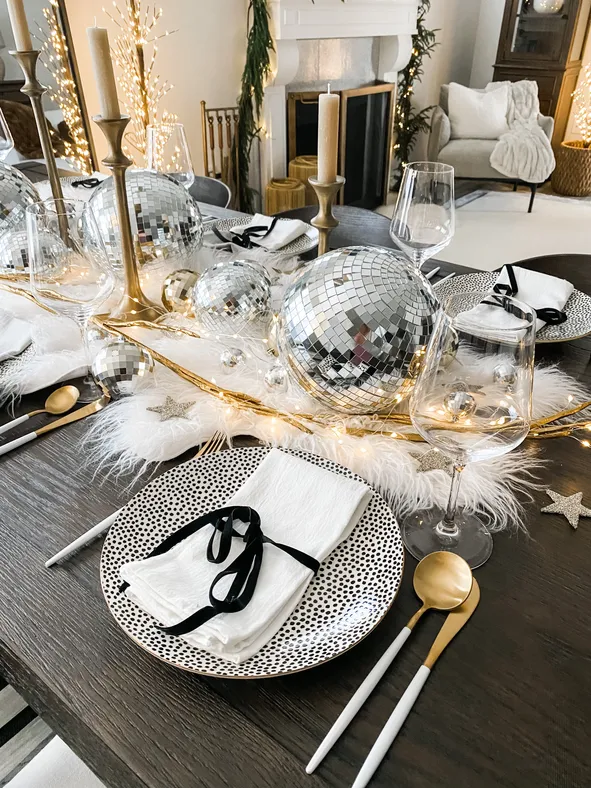 Modern Dining Room Table with Disco Ball Centerpiece and String Lights — New Years Eve Party 2027