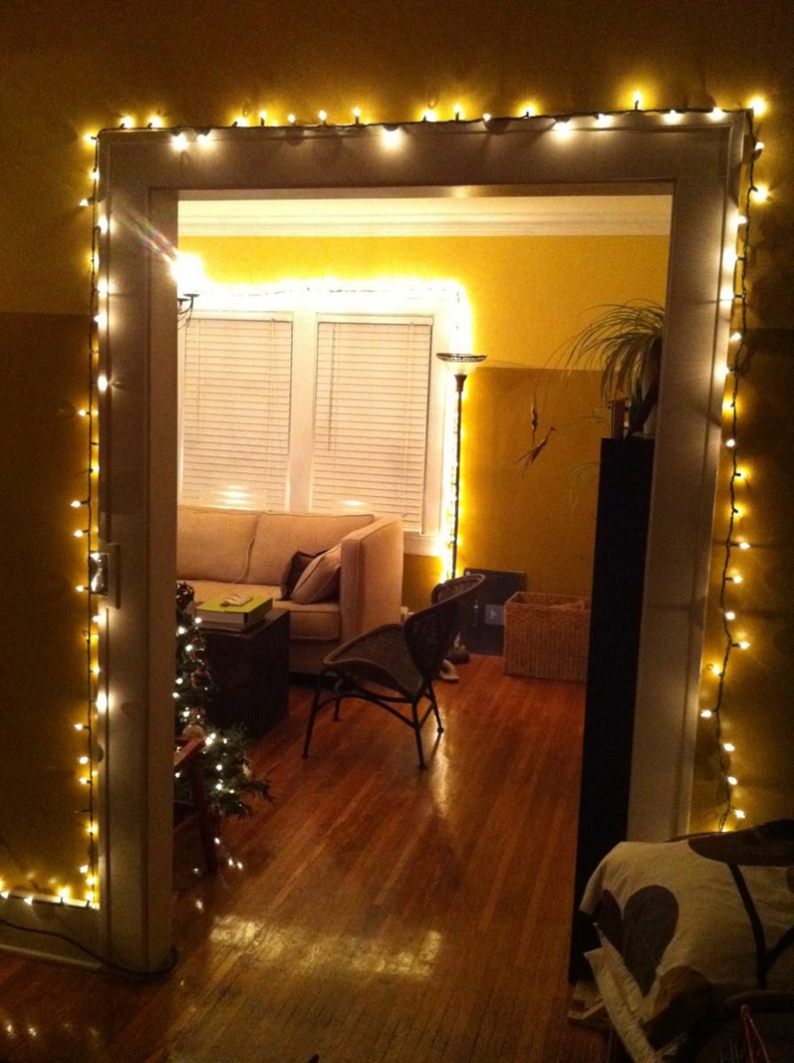 Doorway Draped in Fairy Lights Welcoming Guests Doorway Draped in Fairy Lights Welcoming Guests — Christmas Fairy Lights Living Room