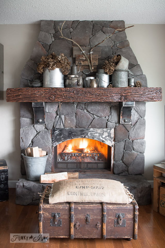 Dramatic Stone Fireplace with Rustic Accents Dramatic Stone Fireplace with Rustic Accents — Winter Mantel Decor