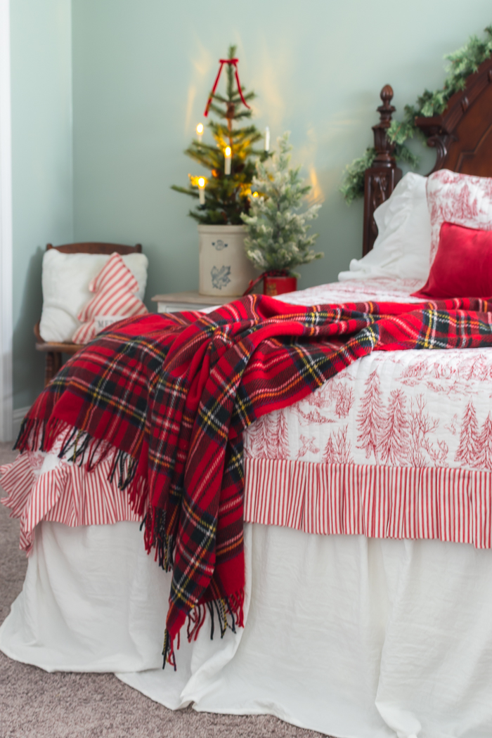 Traditional Bedroom with Red Plaid Throw and Toile Bedding — Christmas Bedroom Decor