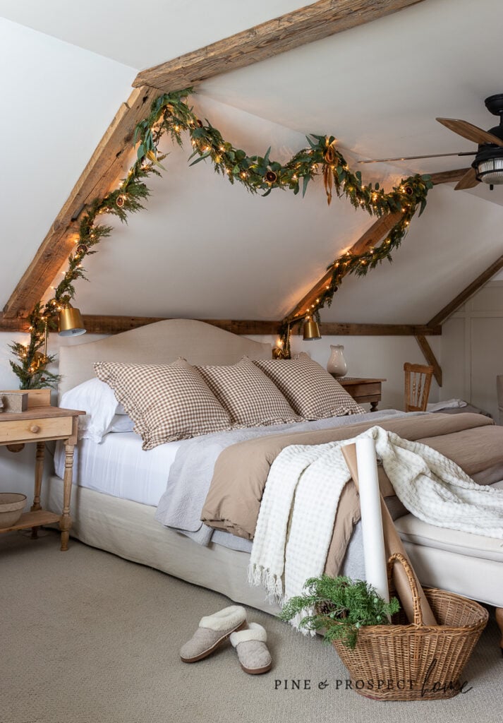 Cozy Cottage Bedroom with Garland on Wooden Beams — Christmas Bedroom Decor