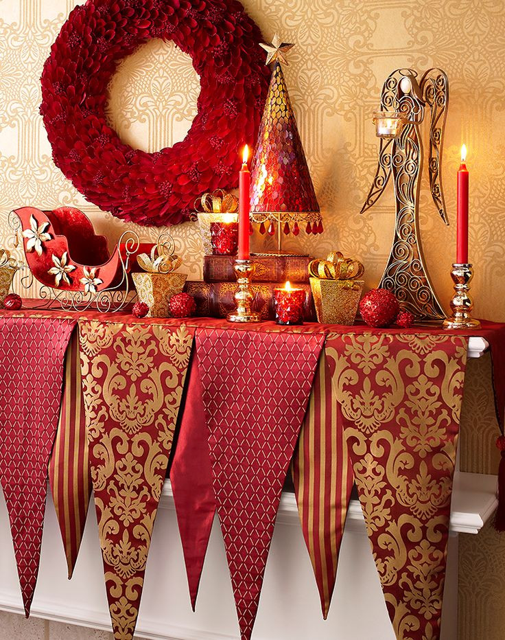 Ornate Mantel Decor with Feathered Wreath and Glittered Elements Ornate Mantel Decor with Feathered Wreath and Glittered Elements — Red and Gold Christmas Decor
