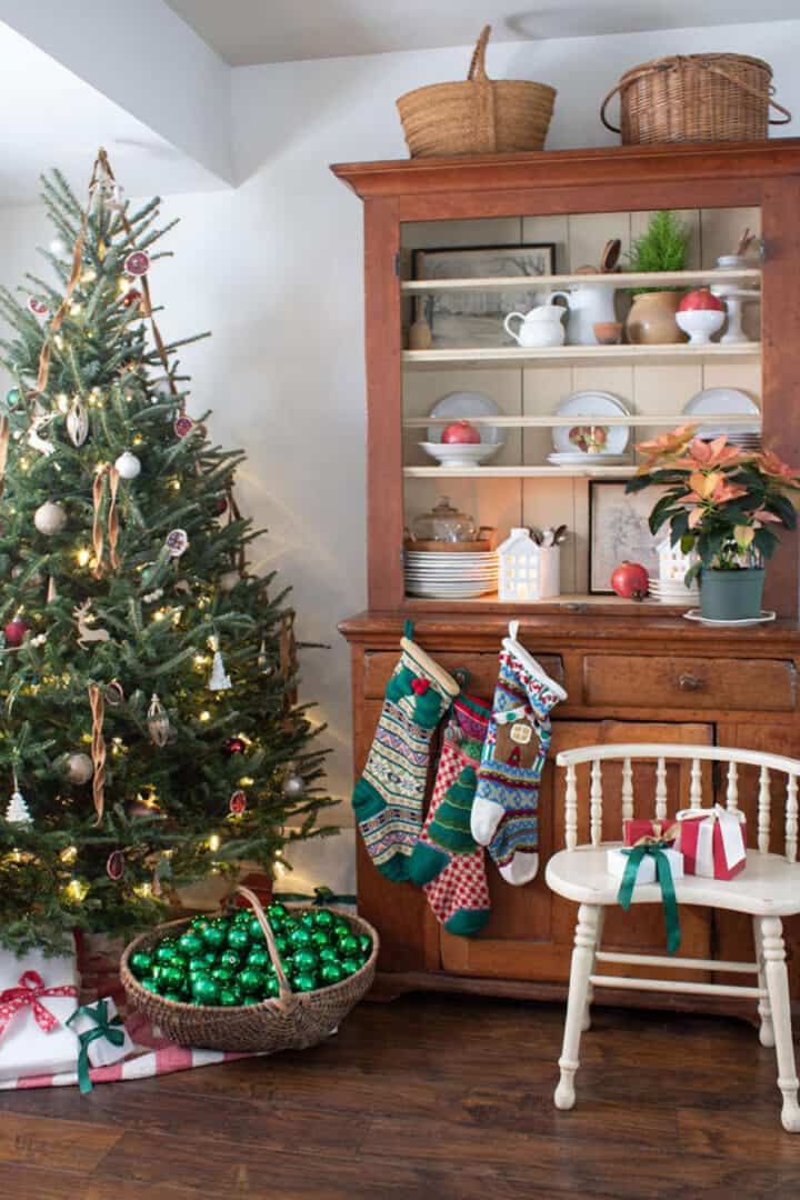 Cozy Corner with Decorated Christmas Tree and Wooden Hutch Cozy Corner with Decorated Christmas Tree and Wooden Hutch — Vintage Christmas Decor