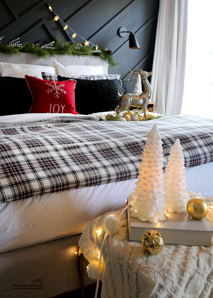 Moody Bedroom with Plaid Bedding and 'JOY' Pillow — Christmas Bedroom Decor