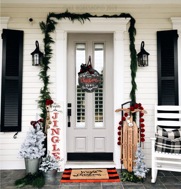 Farmhouse Doorway with Garland, Flocked Trees, and Vintage Sled Farmhouse Doorway with Garland, Flocked Trees, and Vintage Sled — Winter Porch Decor