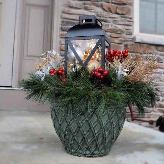 Green Ceramic Planter with Lantern, Greenery, and Gold Ornaments — Christmas Porch Planters