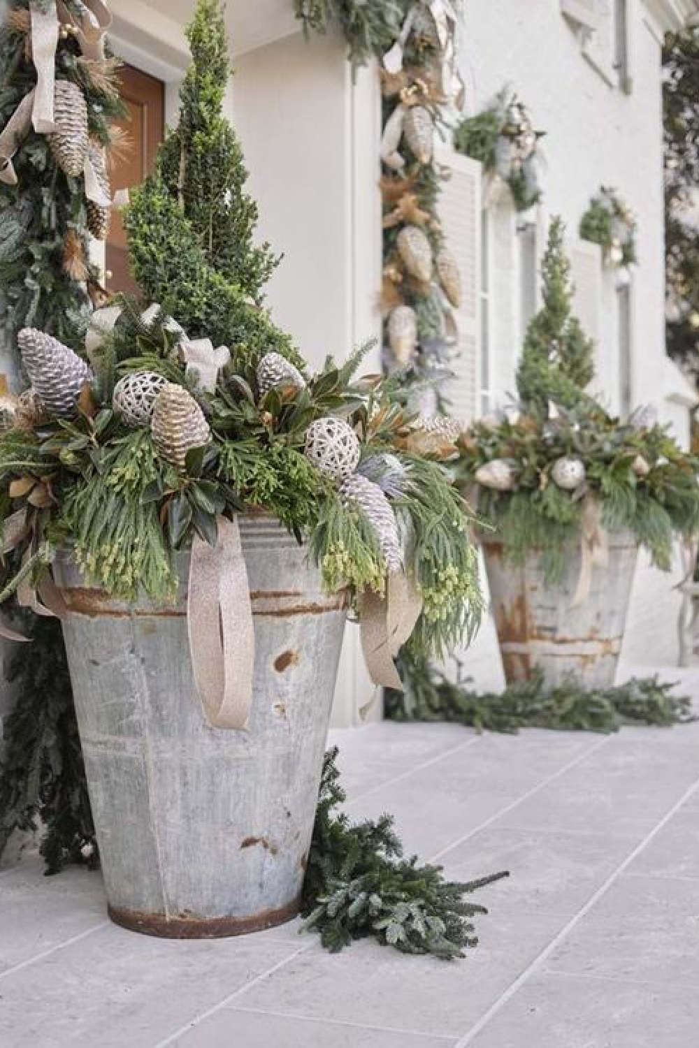 Galvanized Planters with Lush Greenery and Decorative Spheres — Christmas Porch Planters