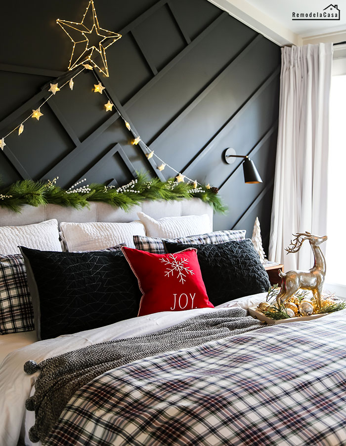 Modern Bedroom with Festive Plaid Bedding and Garland — Christmas Bedroom Decor